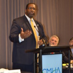 Kevin Fischer Accepting the Go To Bat Award A man speaking at a podium.