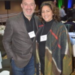 Turning Leaf Behavioral Health Services - Lunch Sponsors on Tuesday, February 4, 2025! A man and woman wearing name tags pose together, smiling, at an indoor event.